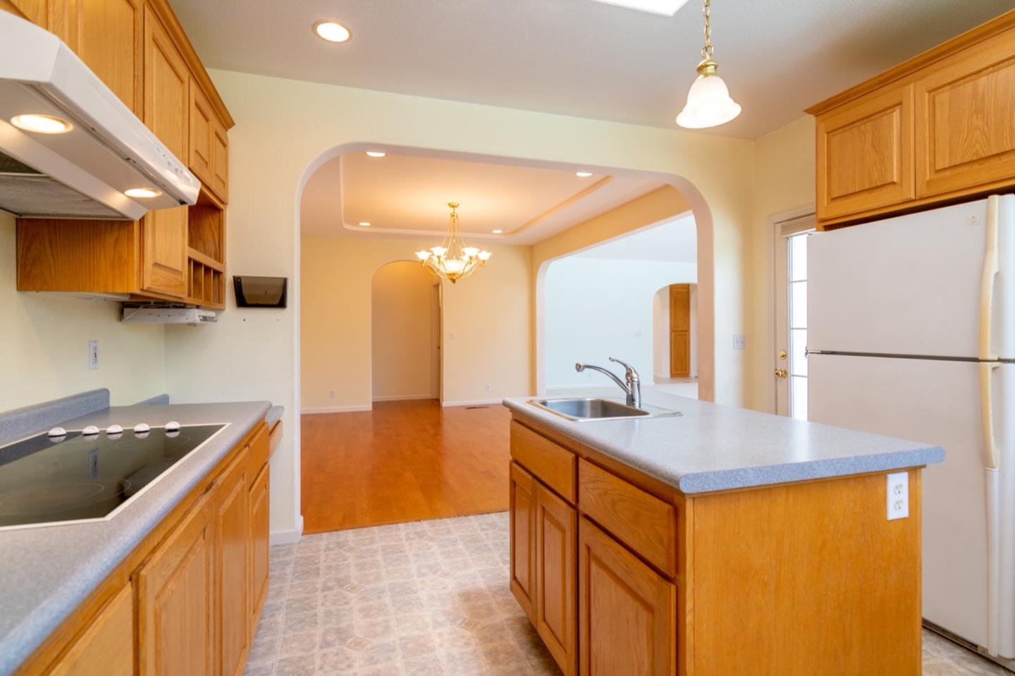 661 Cambrian Drive Campbell, CA 95008 - Photo 10 of 31 a kitchen with stainless steel appliances granite countertop a sink a stove and a refrigerator