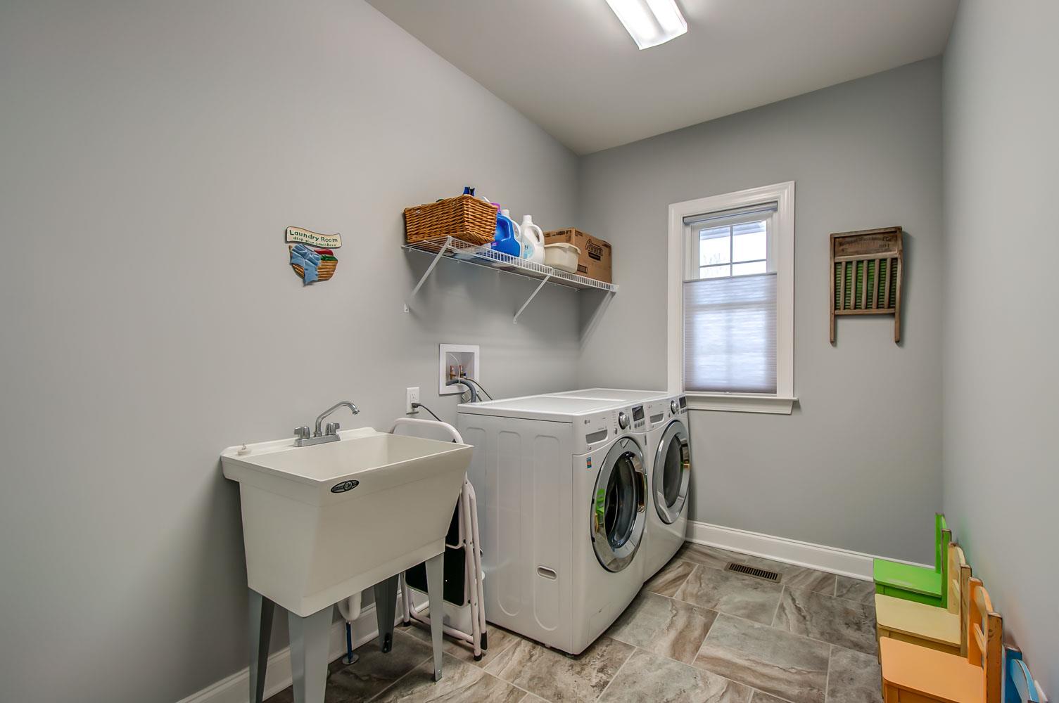5705 Hopewell Ridge Road Franklin, TN 37064 - Photo 13 of 30 a utility room with dryer and washer