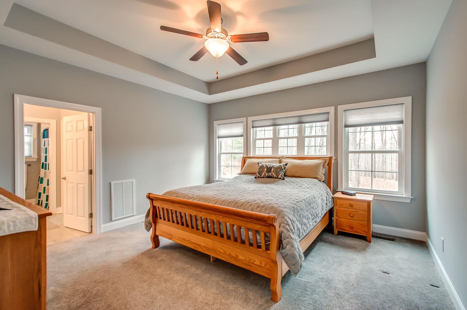 5705 Hopewell Ridge Road Franklin, TN 37064 - Photo 14 of 30 a bed sitting in a bedroom next to a window