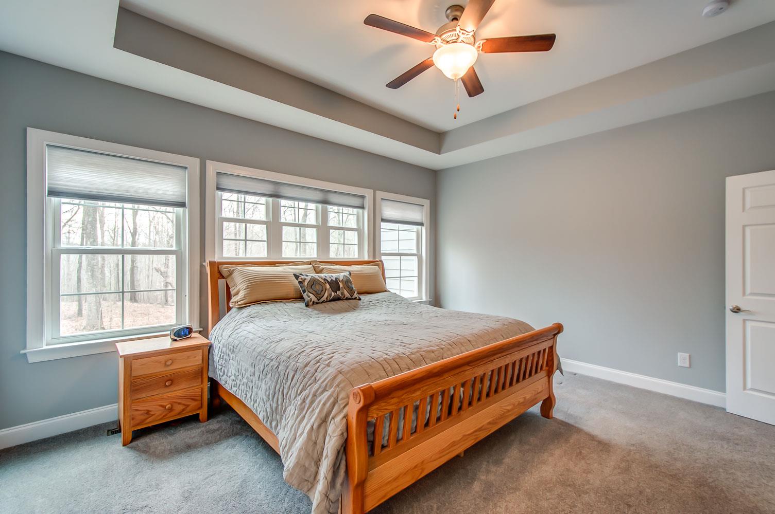 5705 Hopewell Ridge Road Franklin, TN 37064 - Photo 15 of 30 a bed sitting in a bedroom next to a window