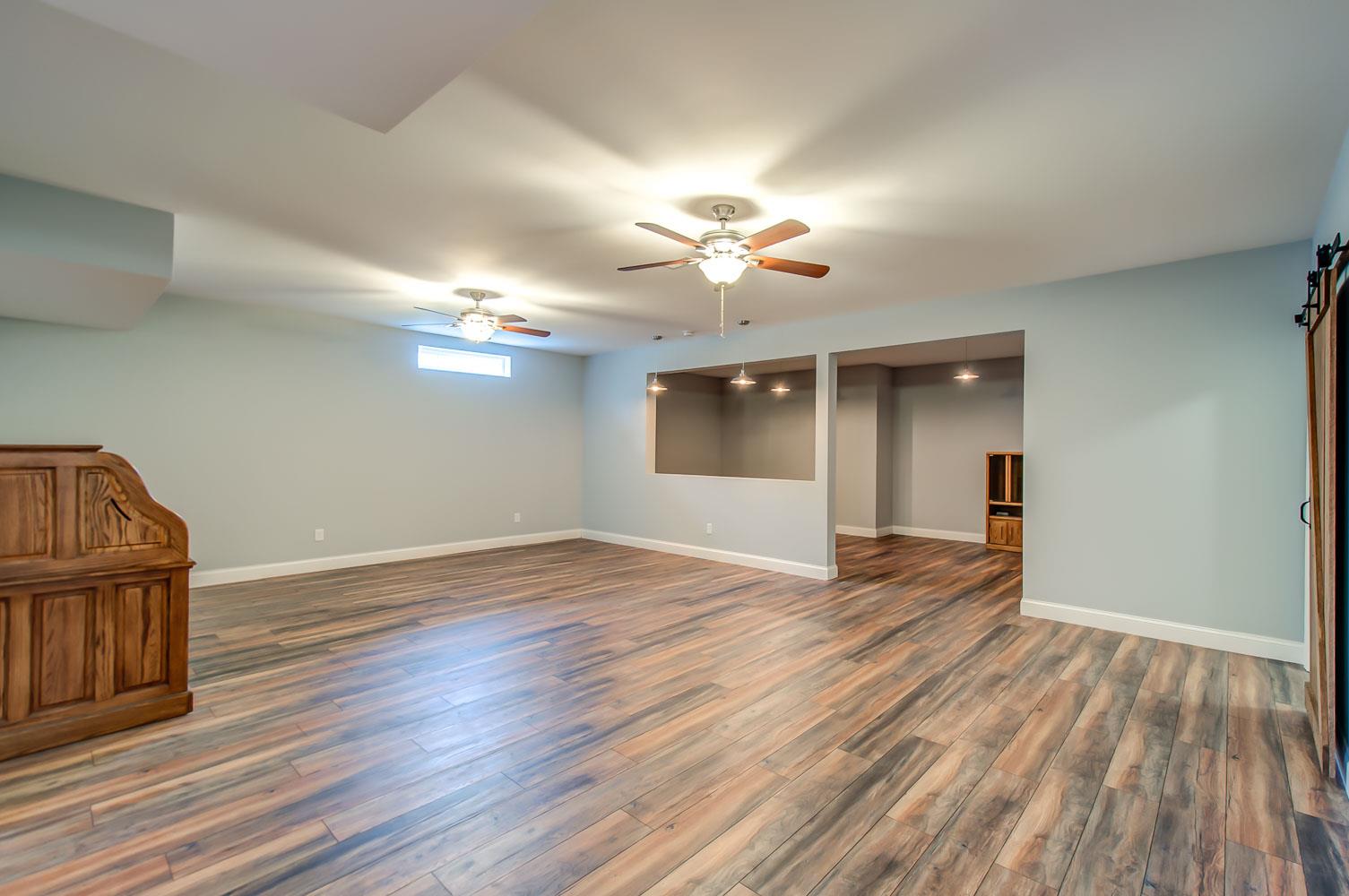 5705 Hopewell Ridge Road Franklin, TN 37064 - Photo 20 of 30 a view of empty room with wooden floor and fan