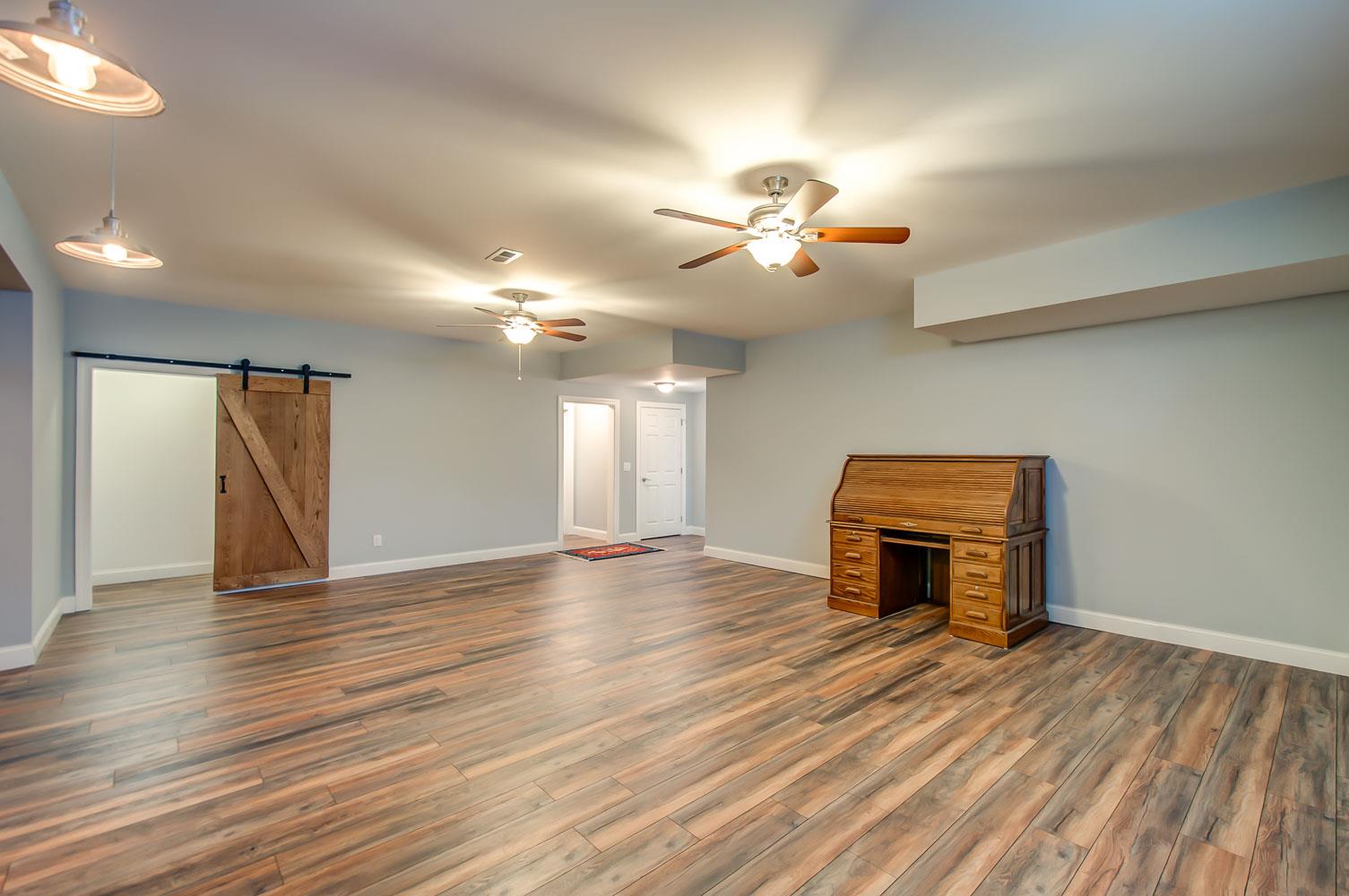 5705 Hopewell Ridge Road Franklin, TN 37064 - Photo 22 of 30 a view of empty room with wooden floor and fan