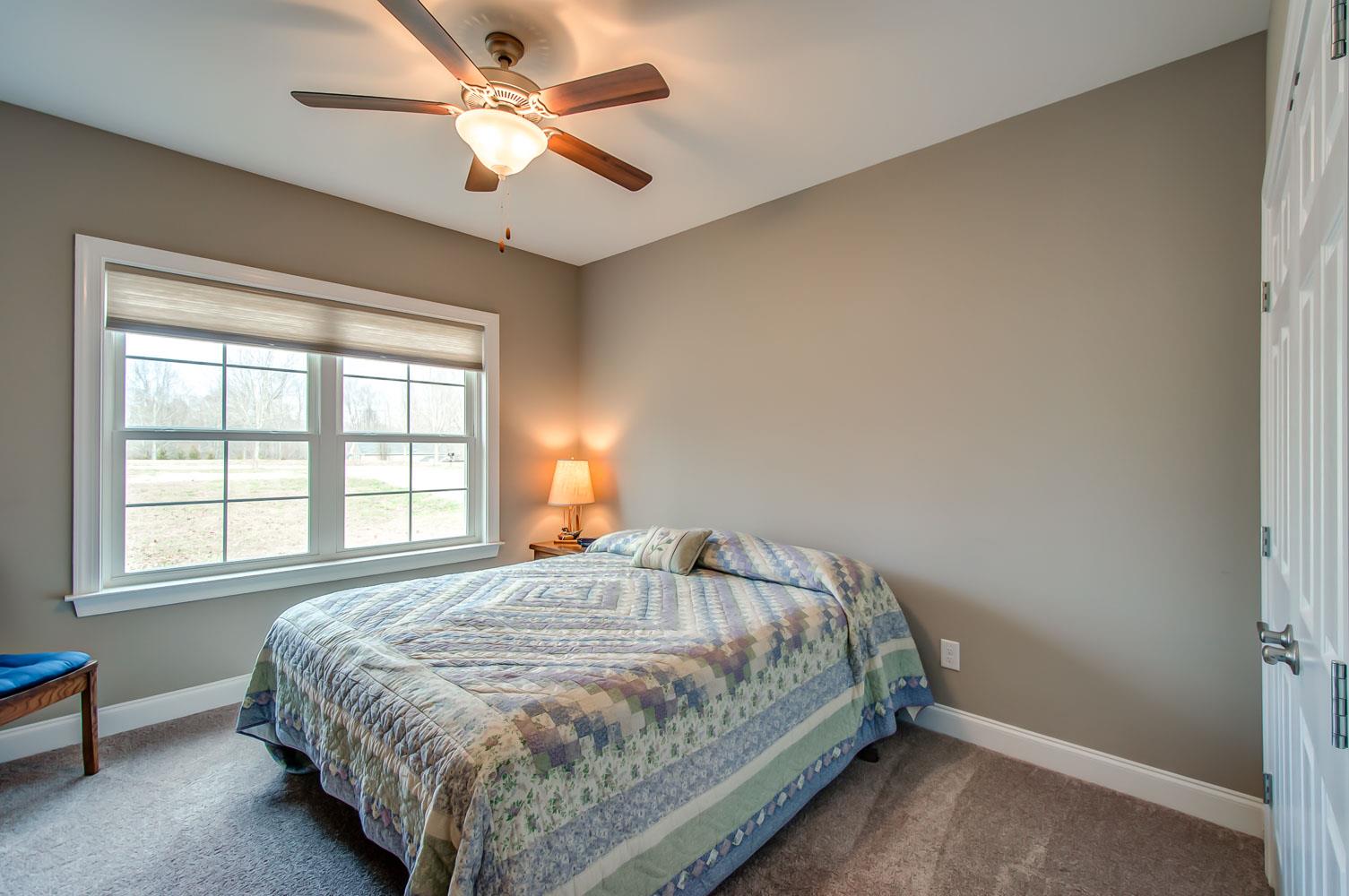 5705 Hopewell Ridge Road Franklin, TN 37064 - Photo 25 of 30 a bedroom with a bed and a window