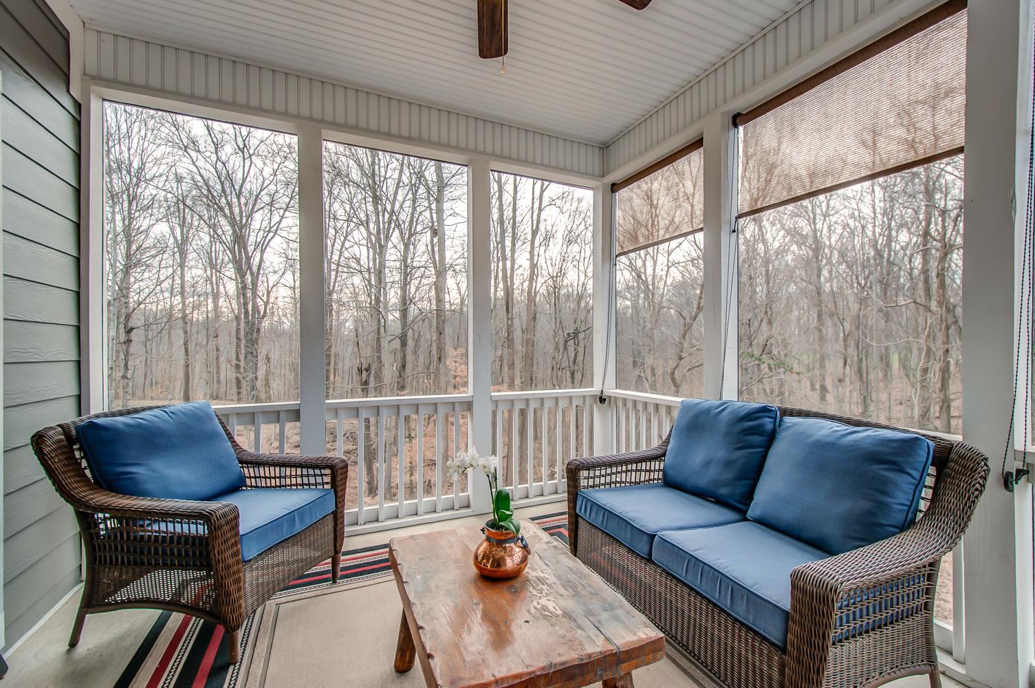 5705 Hopewell Ridge Road Franklin, TN 37064 - Photo 7 of 30 a living room with furniture and a floor to ceiling window