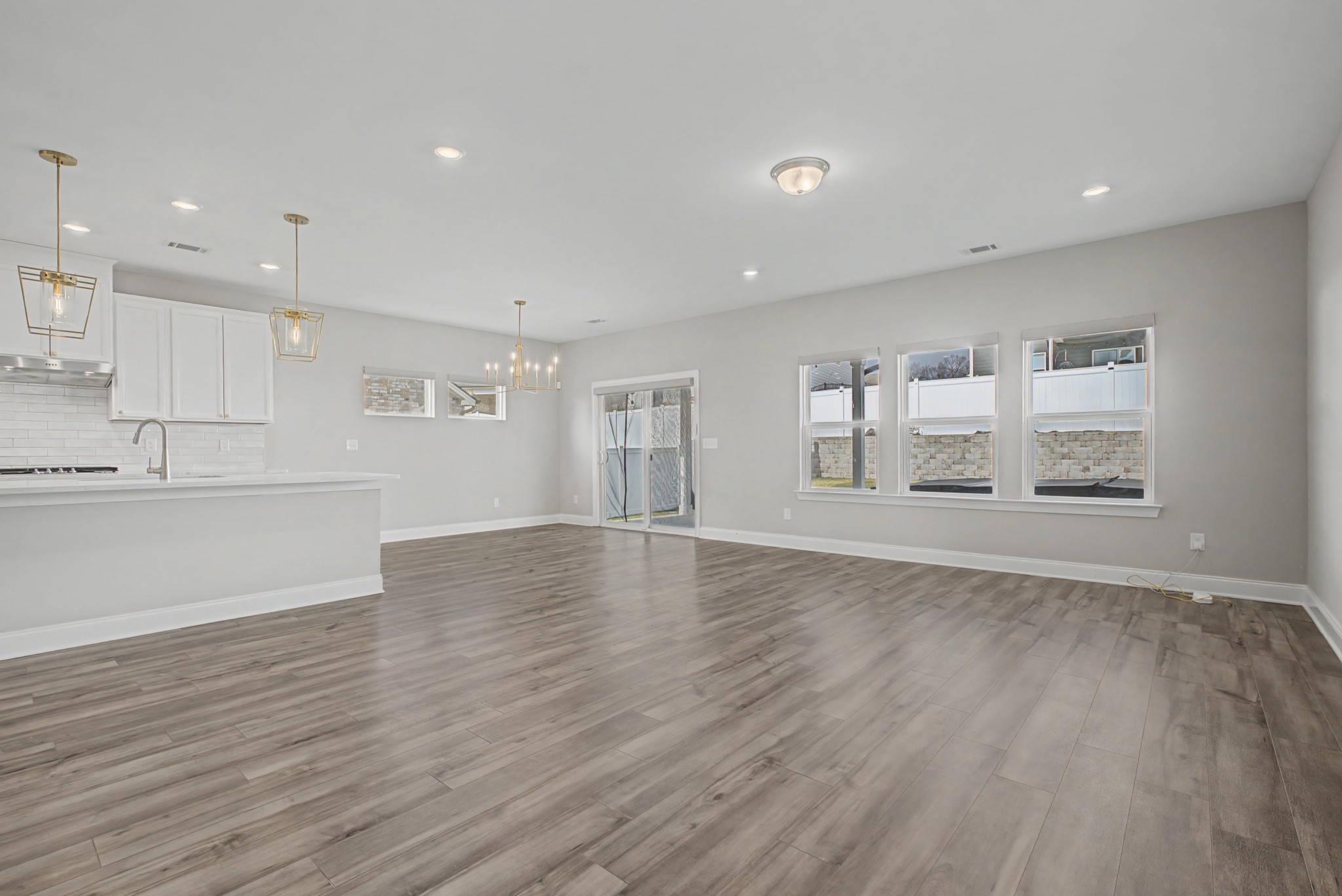 1205 Bridgett Way Mount Juliet, TN 37122 - Photo 19 of 43 an empty room with wooden floor and windows