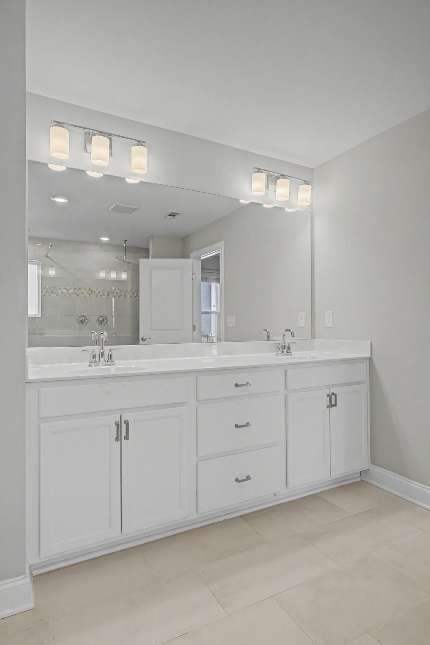 1205 Bridgett Way Mount Juliet, TN 37122 - Photo 28 of 43 a spacious bathroom with double sink and a mirror