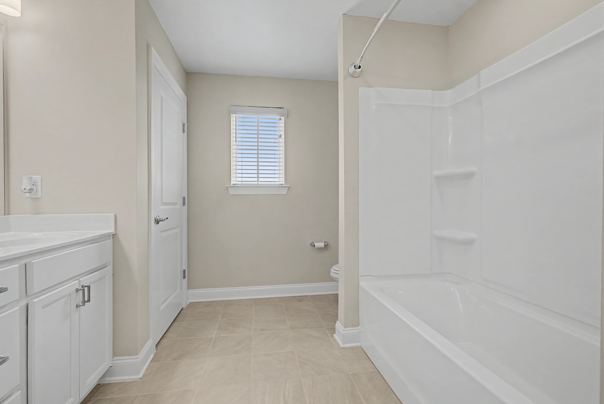 1205 Bridgett Way Mount Juliet, TN 37122 - Photo 37 of 43 a bathroom with a tub shower and a sink