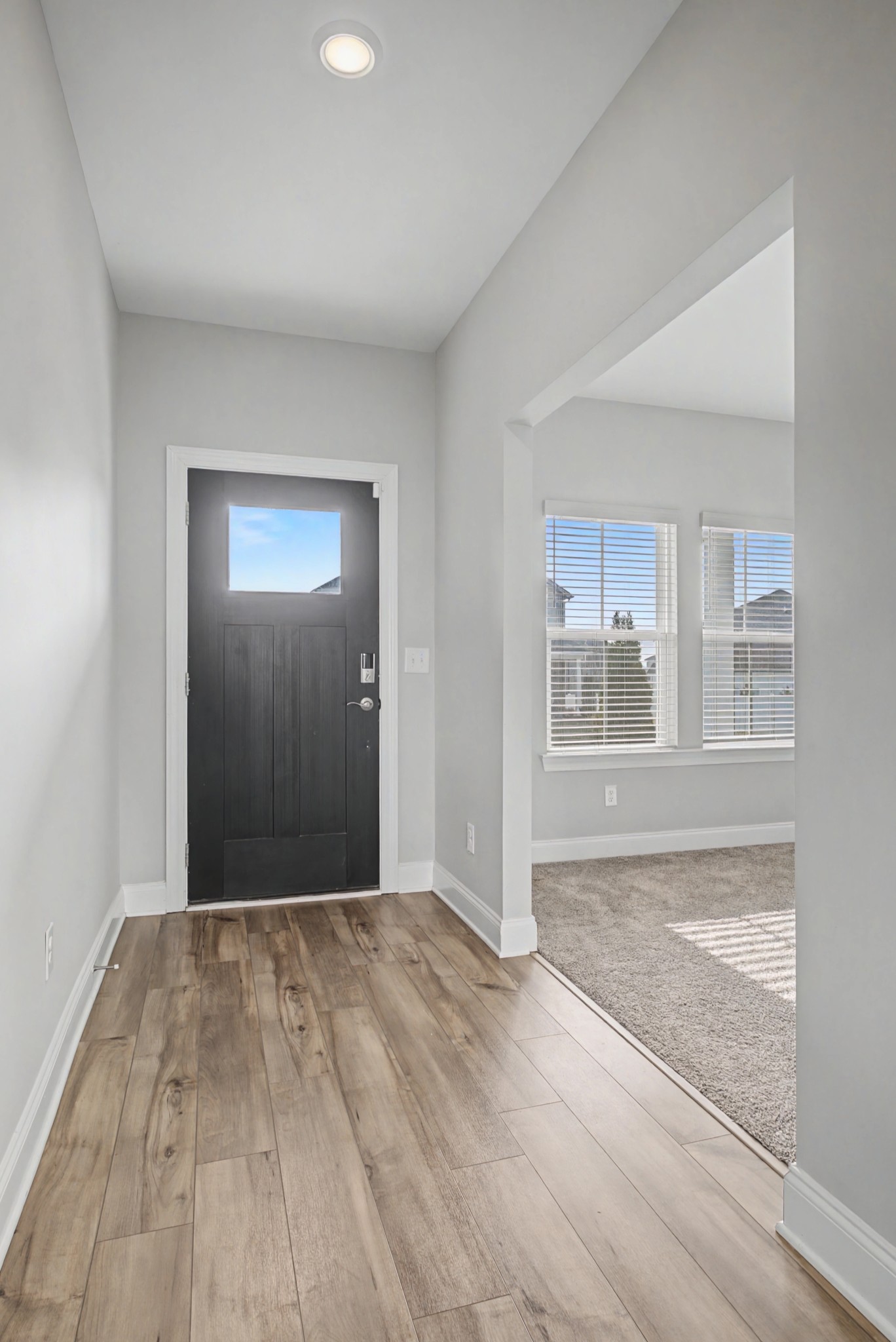 1205 Bridgett Way Mount Juliet, TN 37122 - Photo 6 of 43 a view of a big room with wooden floor and a bathroom
