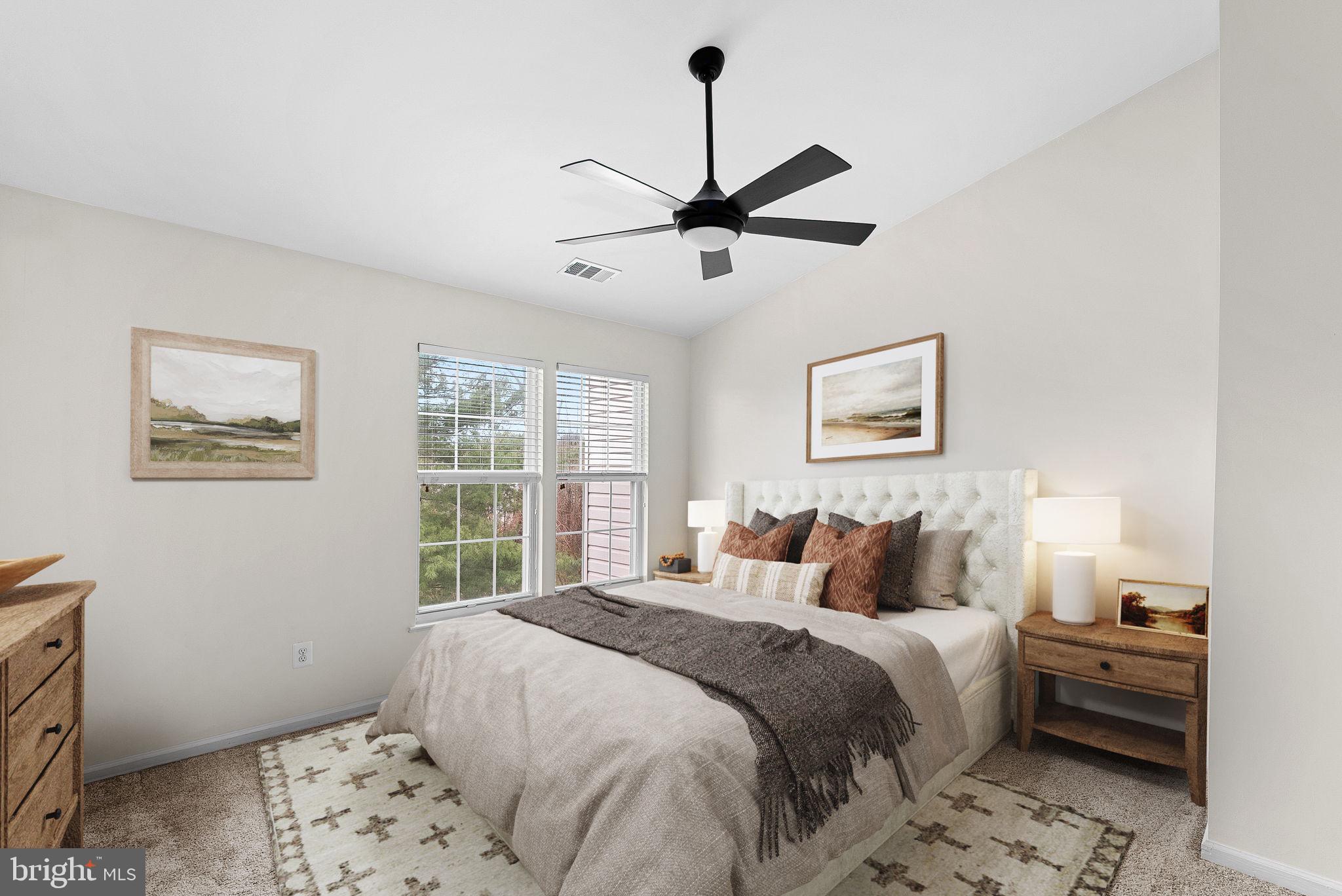 21074 Cornerpost Square Ashburn, VA 20147 - Photo 22 of 81 a bedroom with a bed and a window