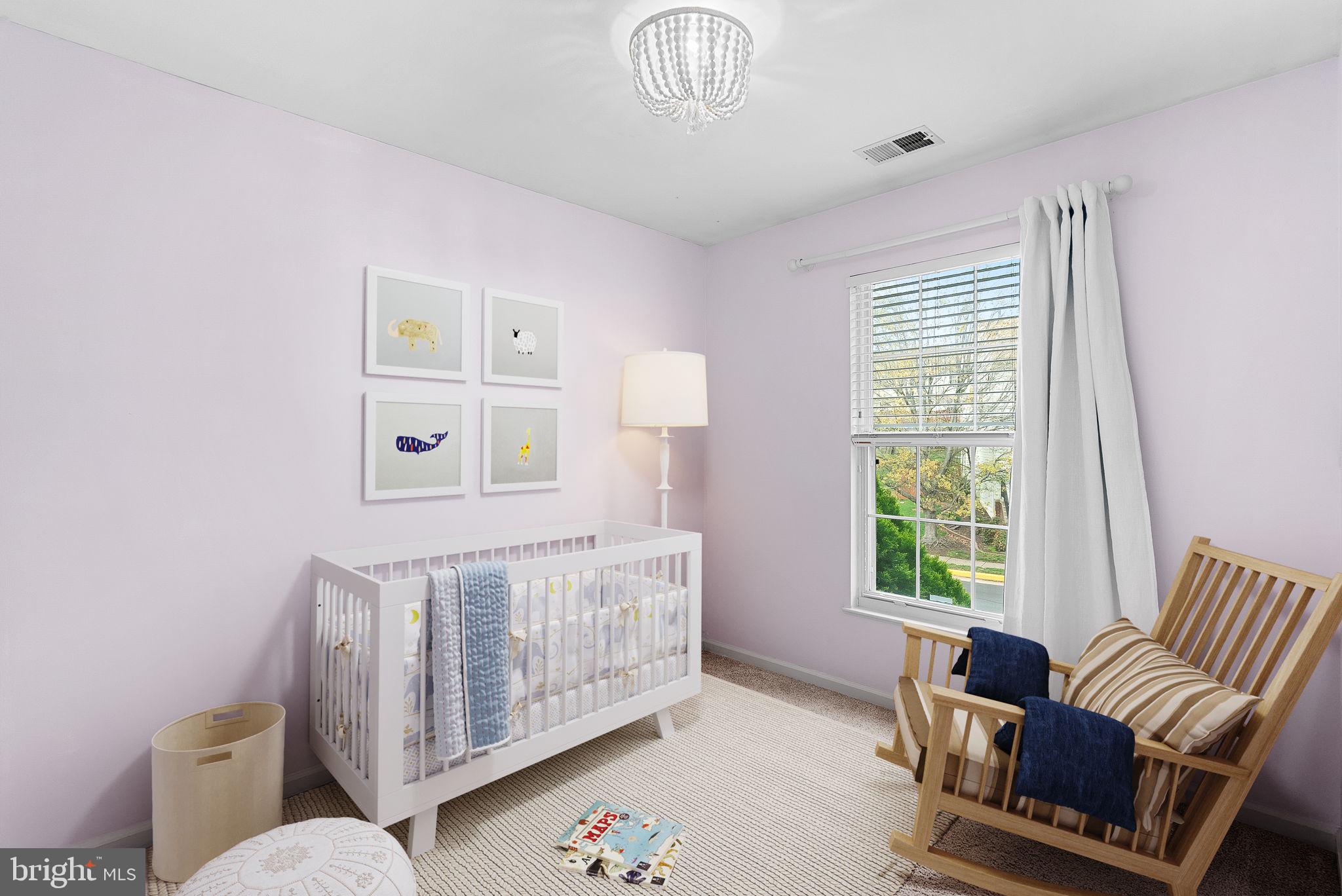 21074 Cornerpost Square Ashburn, VA 20147 - Photo 34 of 81 a living room with furniture and a window