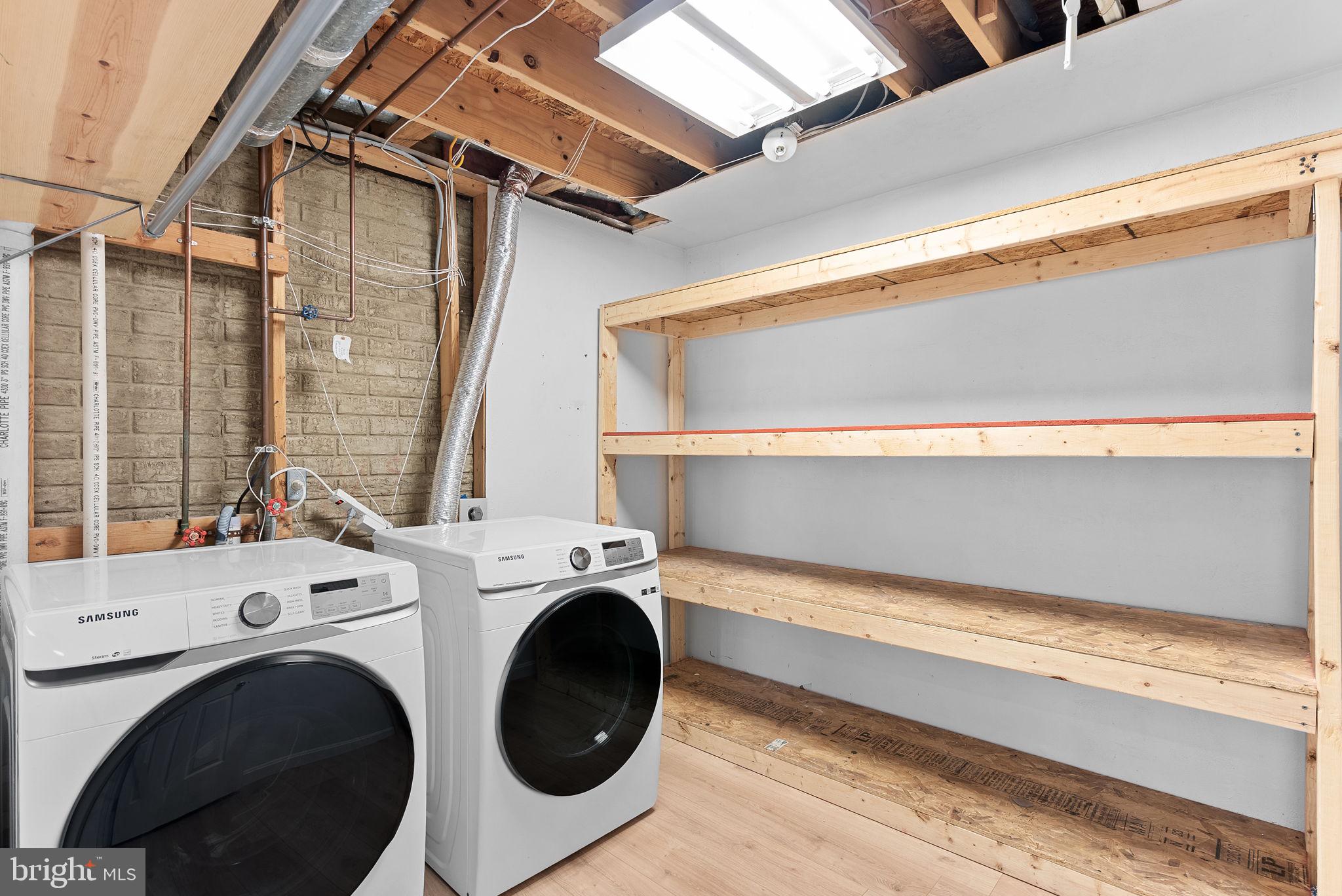 21074 Cornerpost Square Ashburn, VA 20147 - Photo 48 of 81 a utility room with dryer and washer