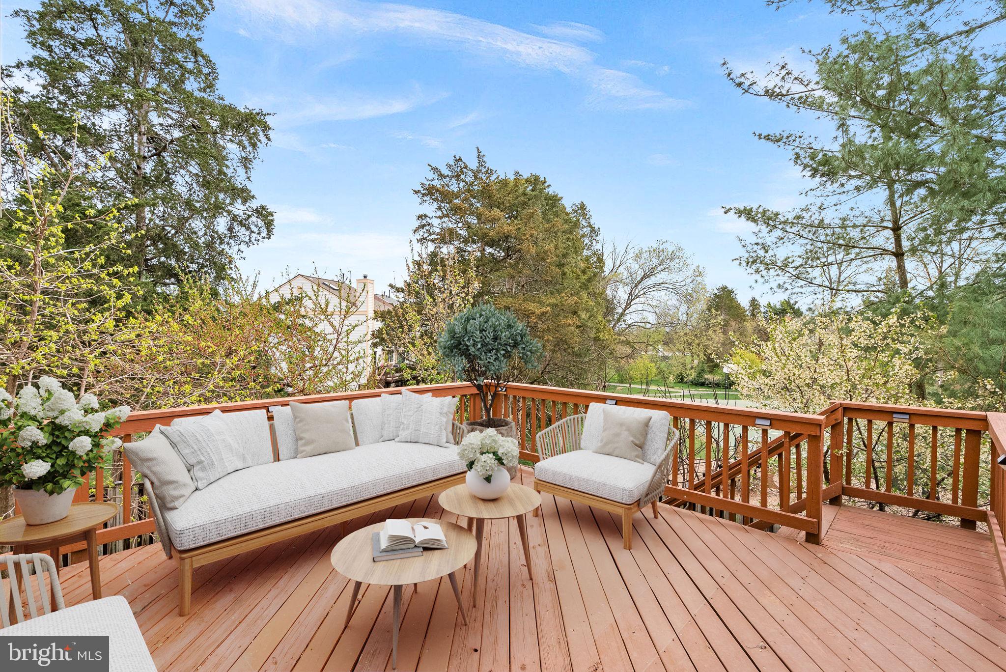 21074 Cornerpost Square Ashburn, VA 20147 - Photo 49 of 81 a balcony with wooden floor and furniture