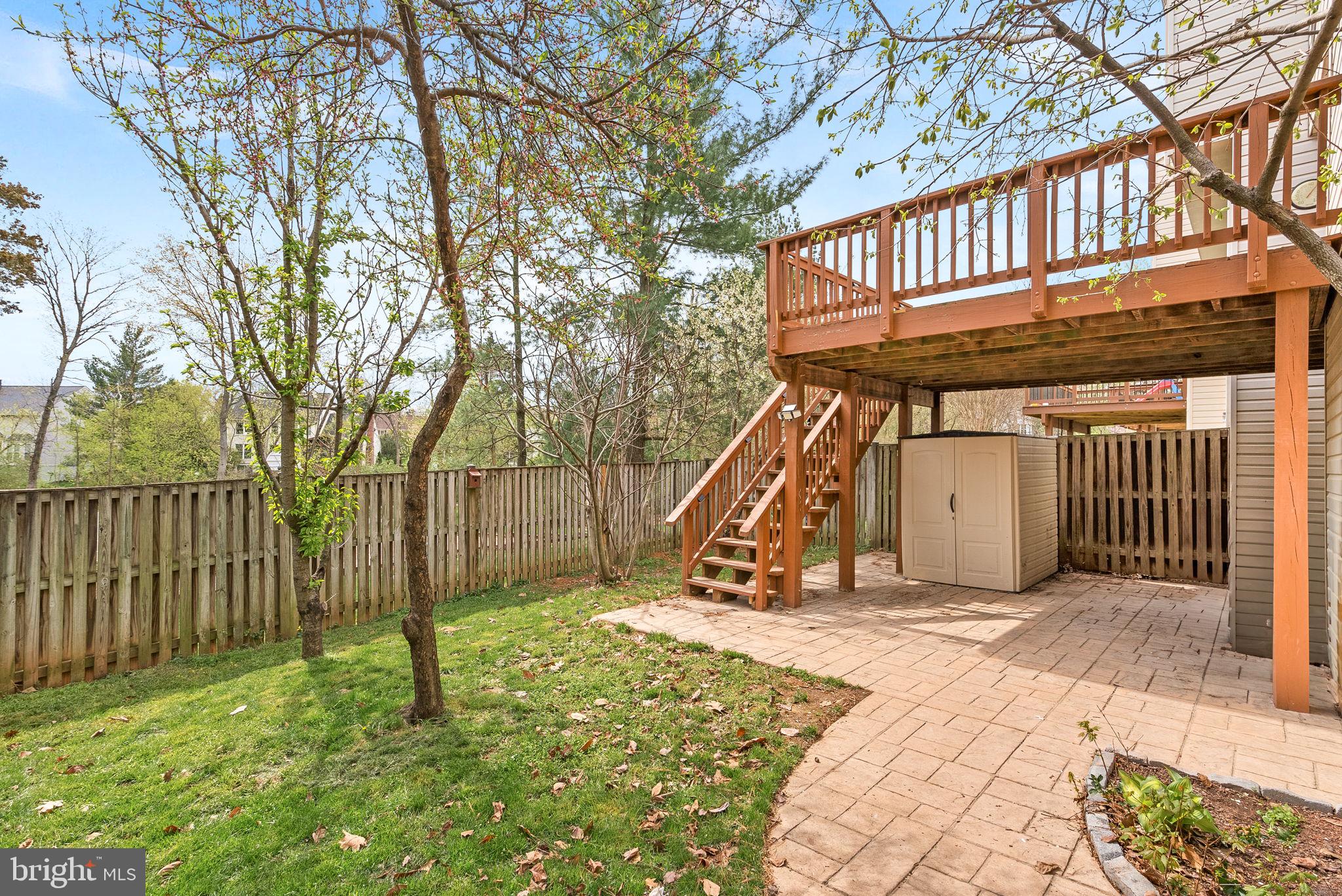 21074 Cornerpost Square Ashburn, VA 20147 - Photo 57 of 81 a view of a house with a wooden deck