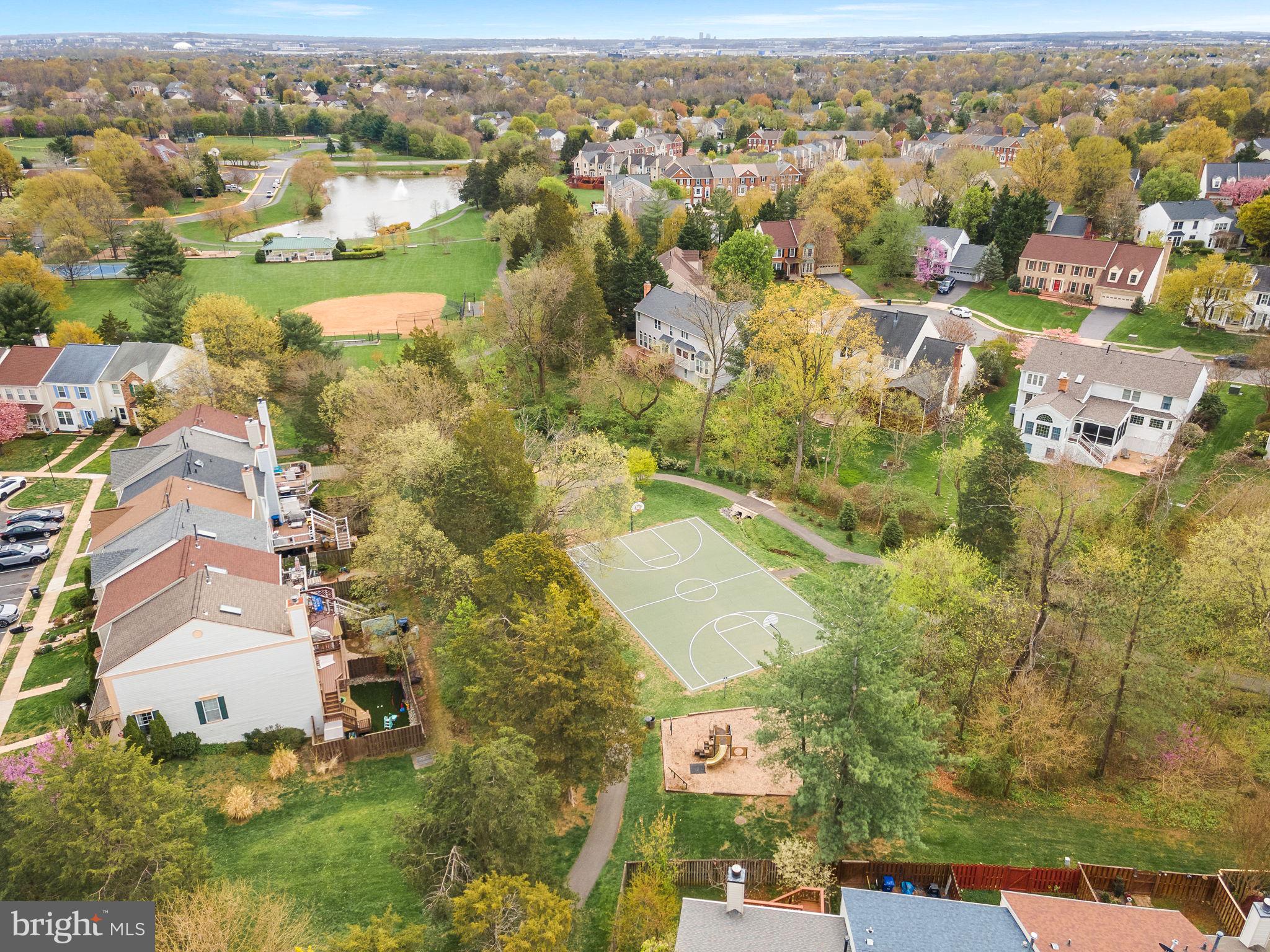21074 Cornerpost Square Ashburn, VA 20147 - Photo 70 of 81 an aerial view of residential building with parking space