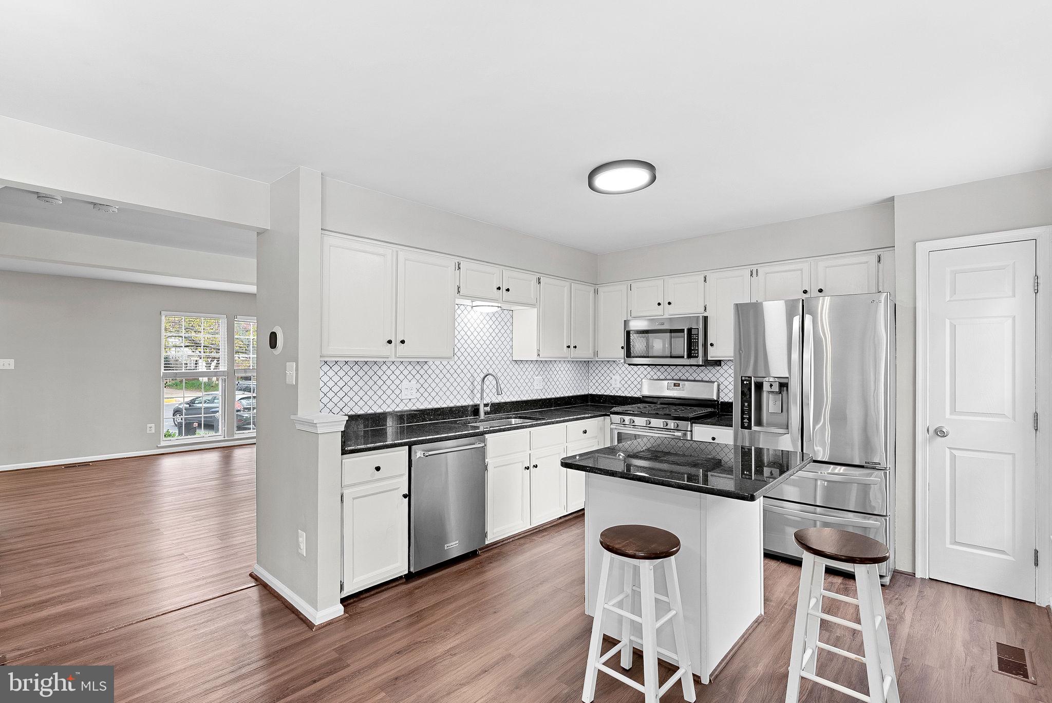 21074 Cornerpost Square Ashburn, VA 20147 - Photo 10 of 81 Kitchen - Stainless Steel Appliances