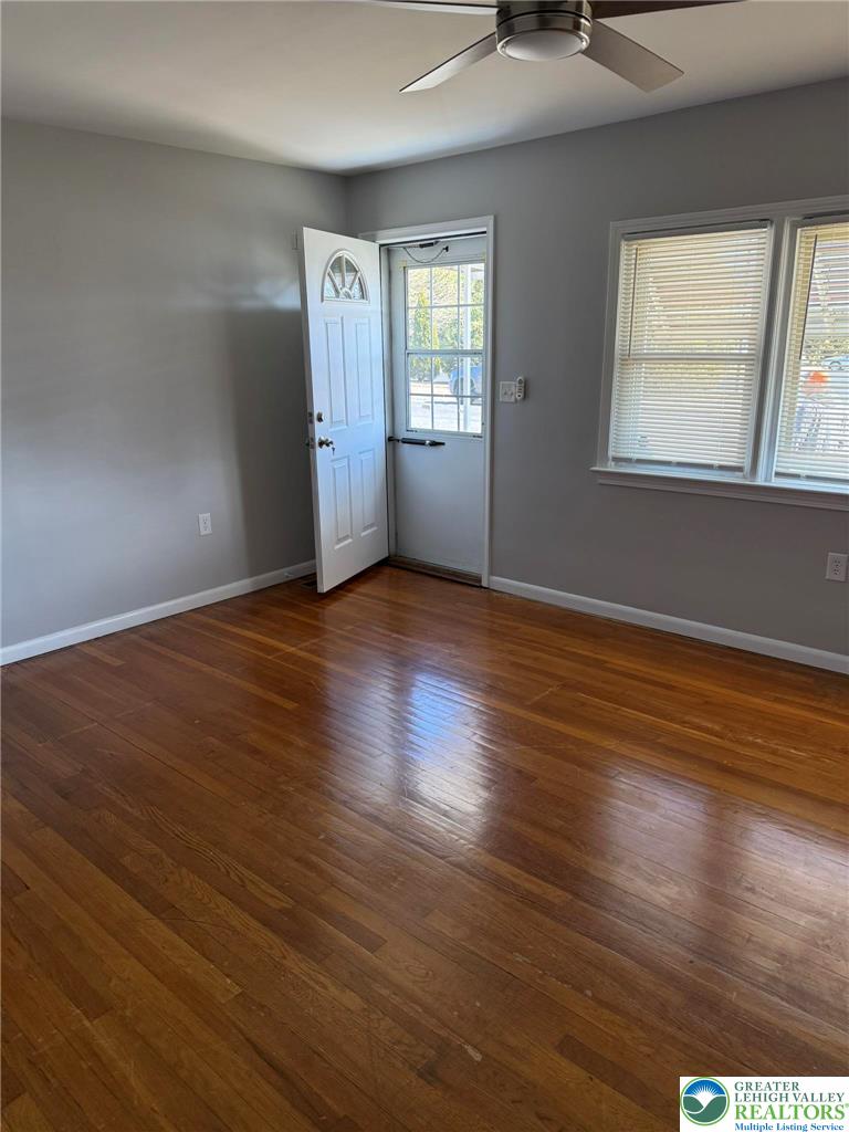 2229 Rodgers Street Bethlehem, PA 18017 - Photo 9 of 17 an empty room with wooden floor and windows