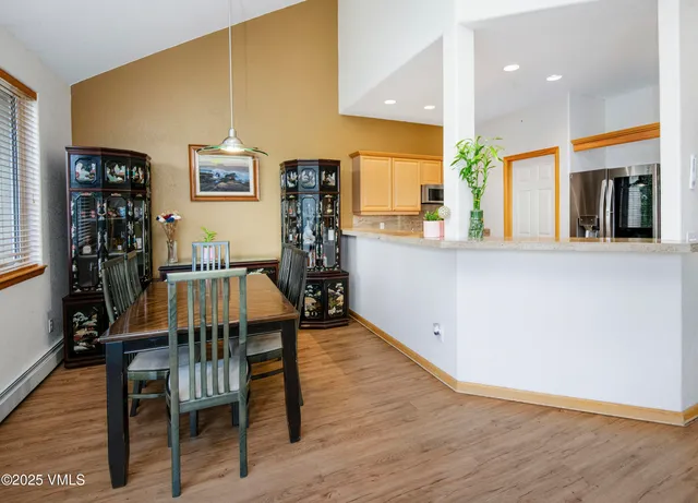 a view of a living room and dining room
