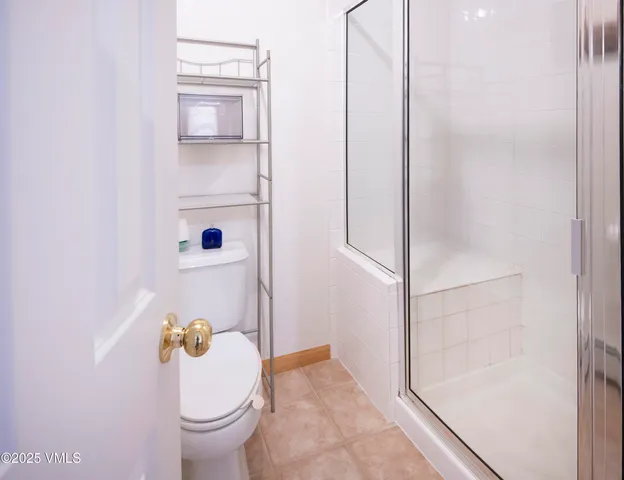 an aerial view of house with yard swimming pool and outdoor seating