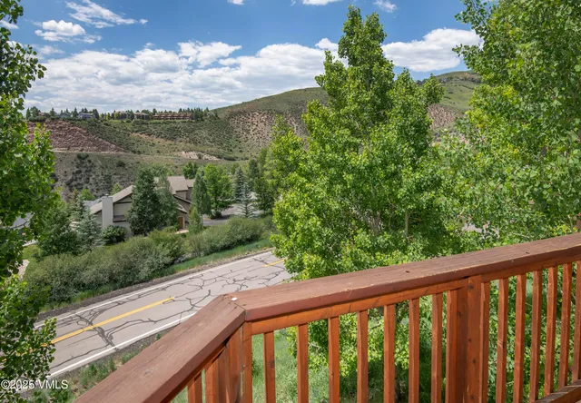 a balcony with an outdoor space