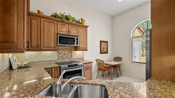 $5,000 | 577 Beachwalk Circle, Unit R202, Naples, FL 34108