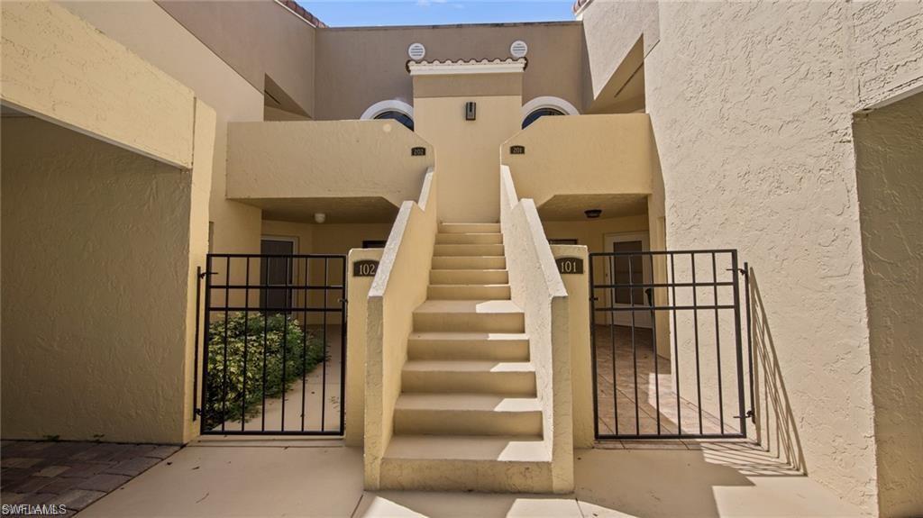 577 Beachwalk Circle, Unit R202 Naples, FL 34108 - Photo 29 of 44 View of stairs