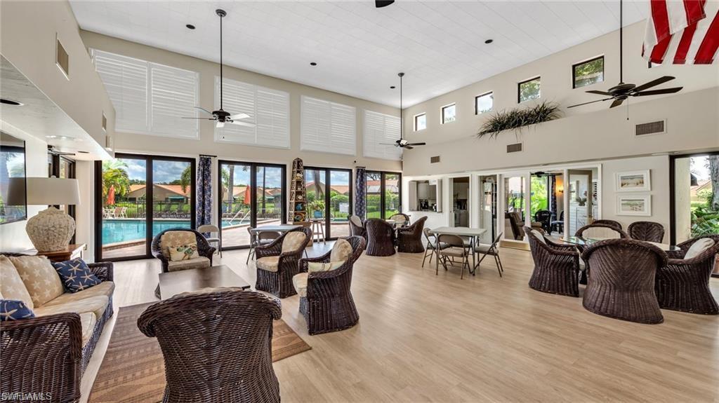 577 Beachwalk Circle, Unit R202 Naples, FL 34108 - Photo 36 of 44 View of sunroom / solarium