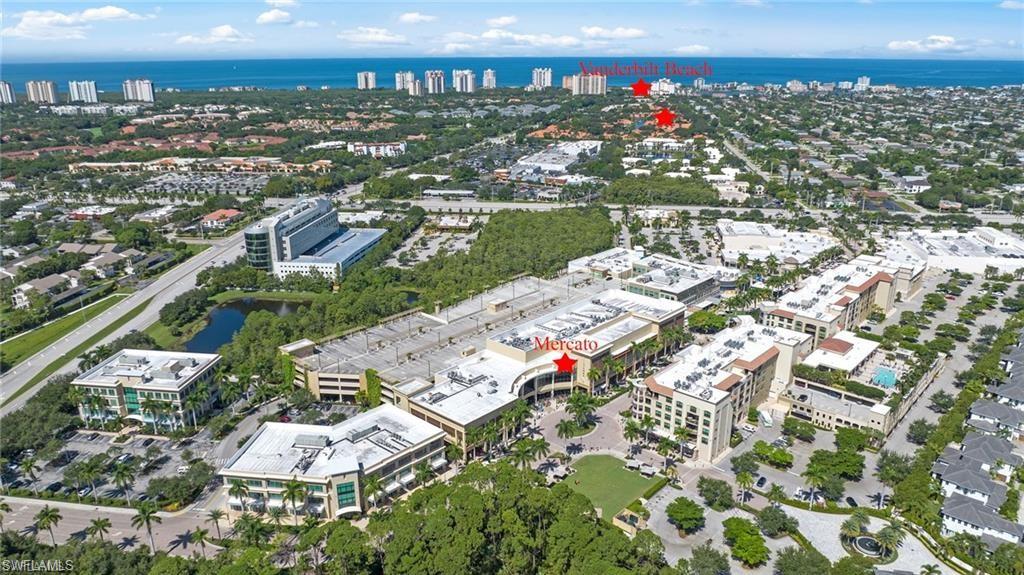 577 Beachwalk Circle, Unit R202 Naples, FL 34108 - Photo 40 of 44 View of urban area with a nearby body of water