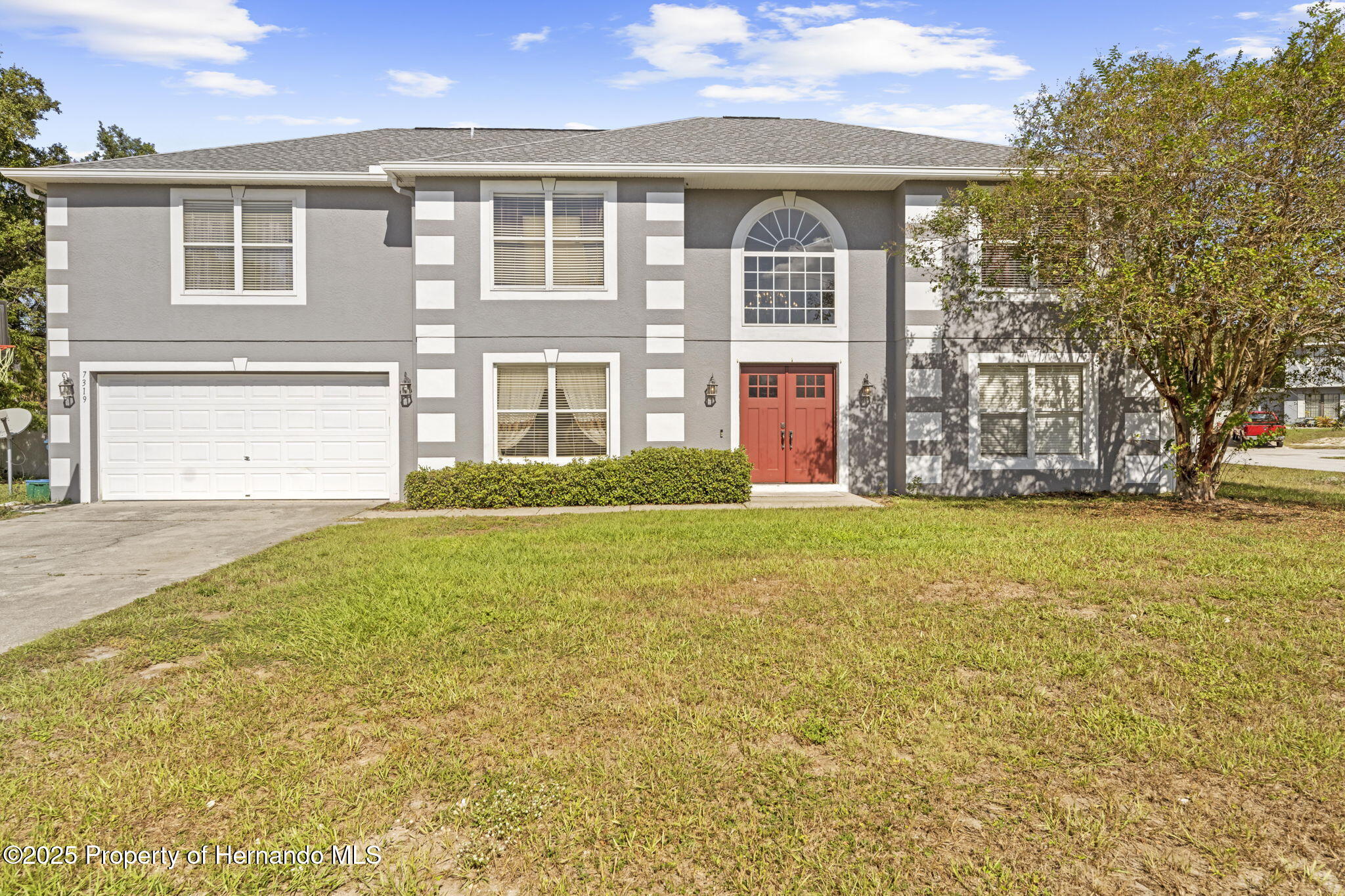 7319 Lagoon Road Spring Hill, FL 34606 - Photo 1 of 60 17-web-or-mls-LCS_4995
