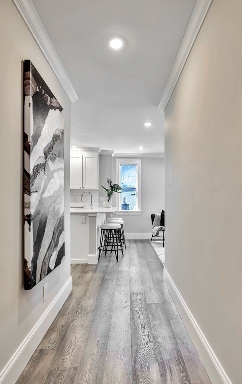 9 R Trenton Street, Unit 1 Boston, MA 02128 - Photo 14 of 15 a view of a living room and dining room