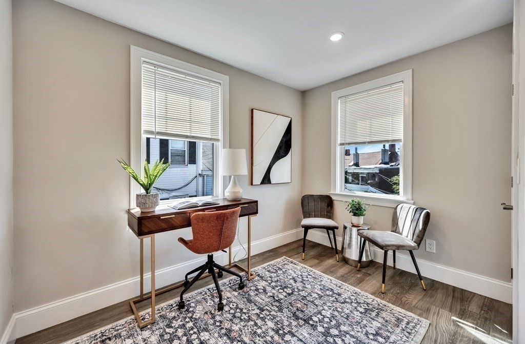 9 R Trenton Street, Unit 1 Boston, MA 02128 - Photo 8 of 15 a workspace room with furniture and wooden floor