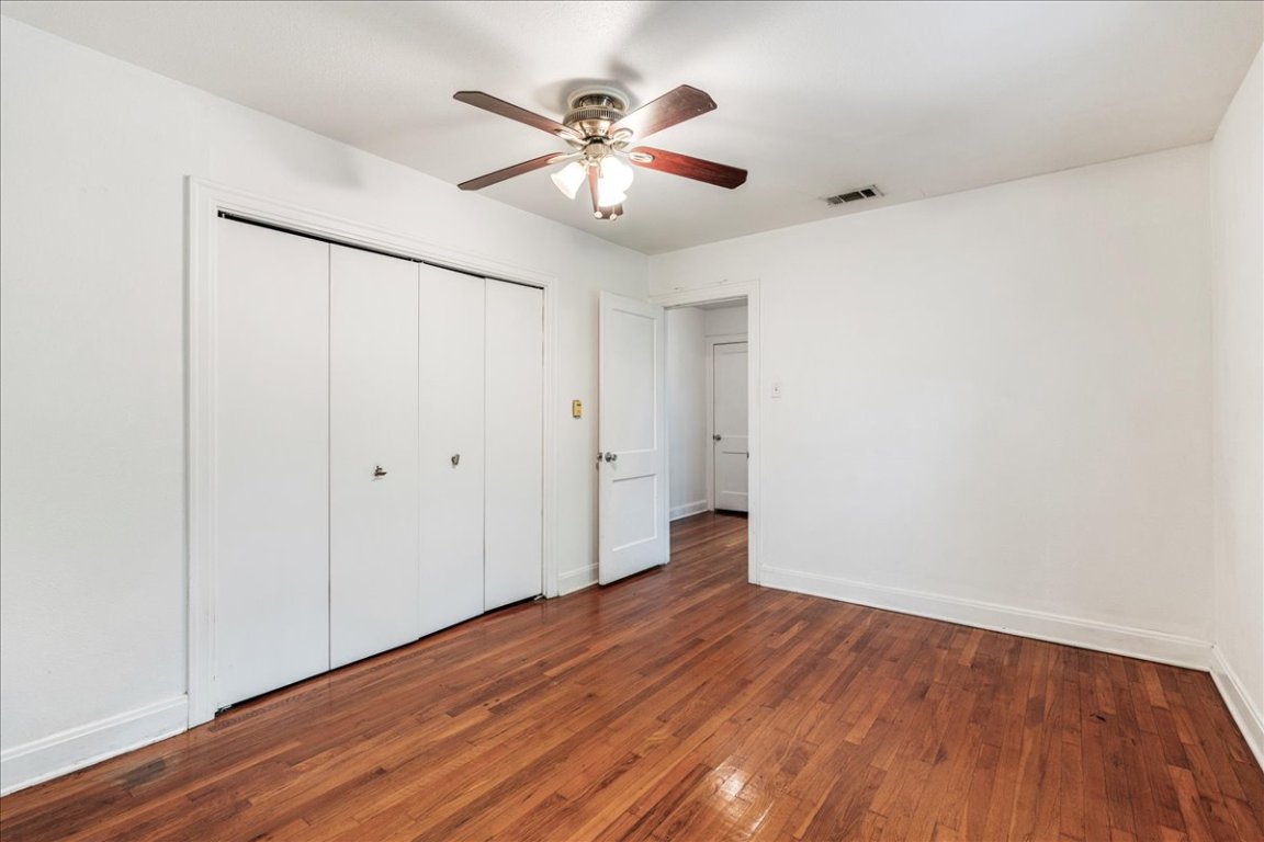 3710 Hollywood Avenue Austin, TX 78722 - Photo 27 of 39 a view of an empty room with wooden floor