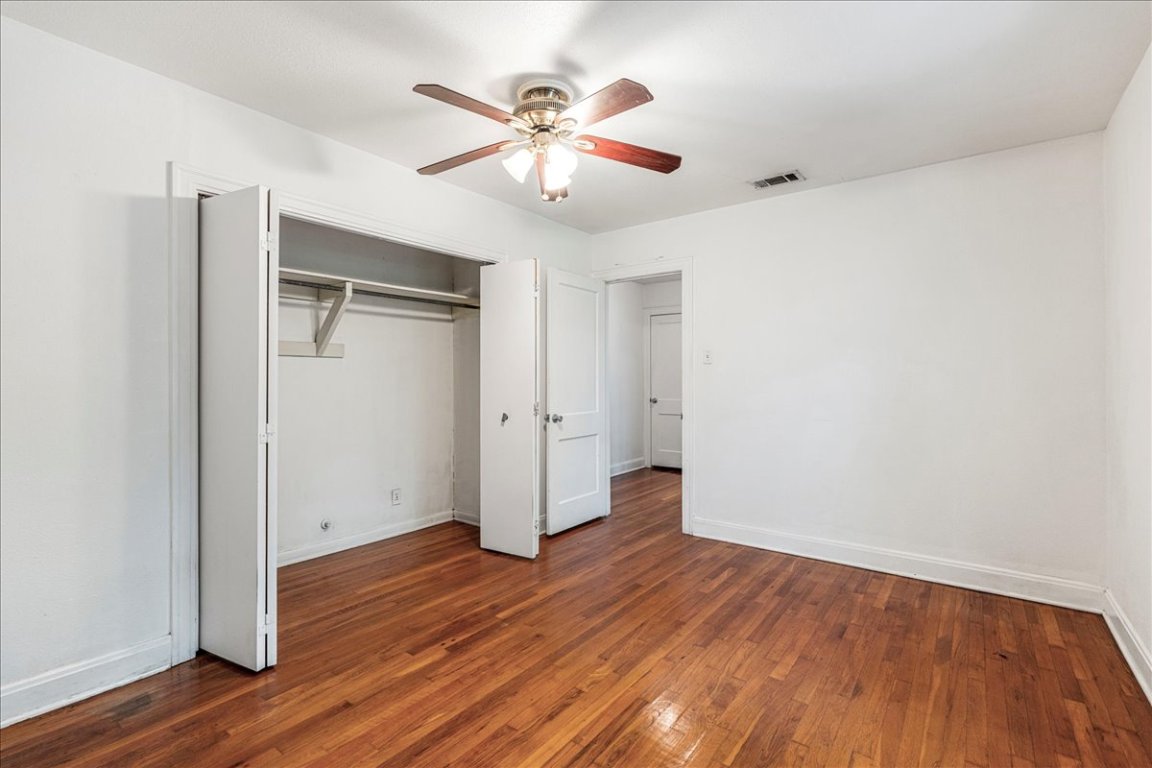 3710 Hollywood Avenue Austin, TX 78722 - Photo 28 of 39 a view of an empty room with wooden floor