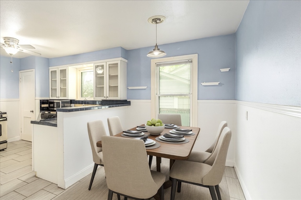 3710 Hollywood Avenue Austin, TX 78722 - Photo 3 of 39 a dining room with furniture and window