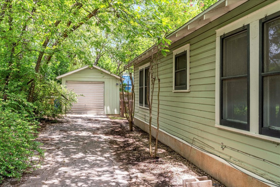 3710 Hollywood Avenue Austin, TX 78722 - Photo 35 of 39 a pathway of a house with a yard