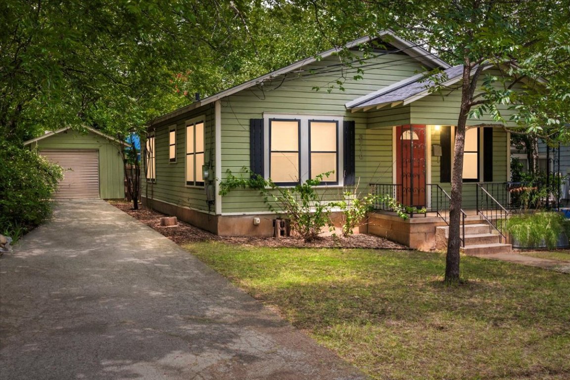 3710 Hollywood Avenue Austin, TX 78722 - Photo 37 of 39 a view of a house with backyard porch and sitting area
