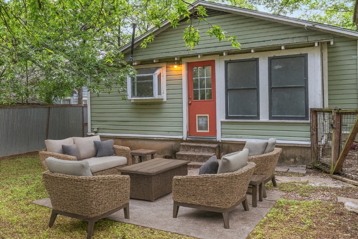 3710 Hollywood Avenue Austin, TX 78722 - Photo 9 of 39 a view of backyard of house with seating space