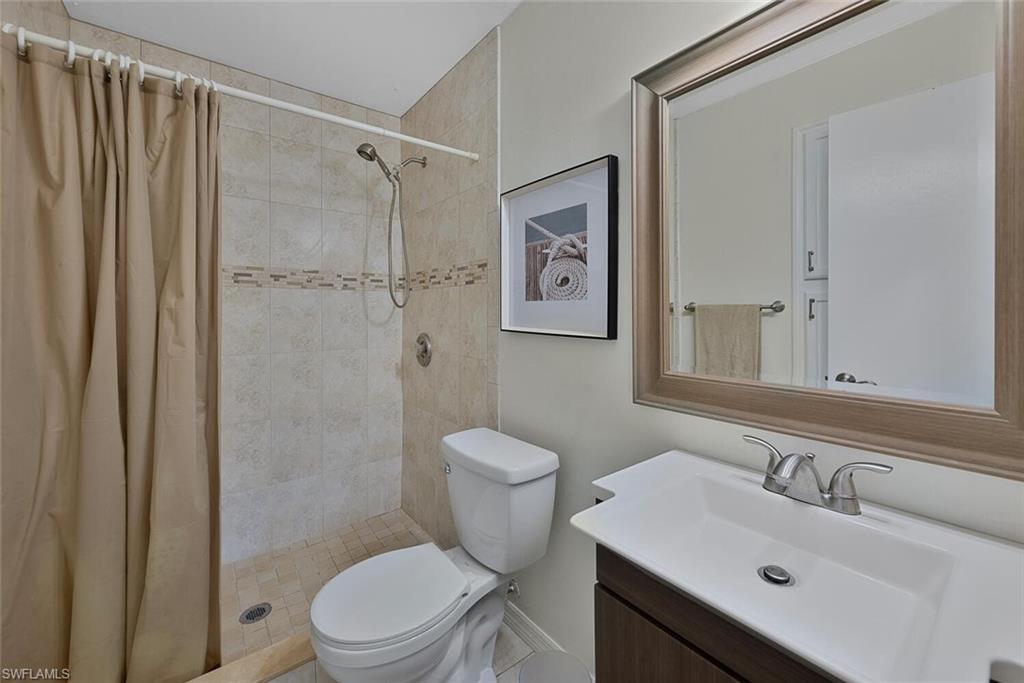 1981 Seminole Harbor Drive Alva, FL 33920 - Photo 14 of 19 a bathroom with a sink toilet and shower