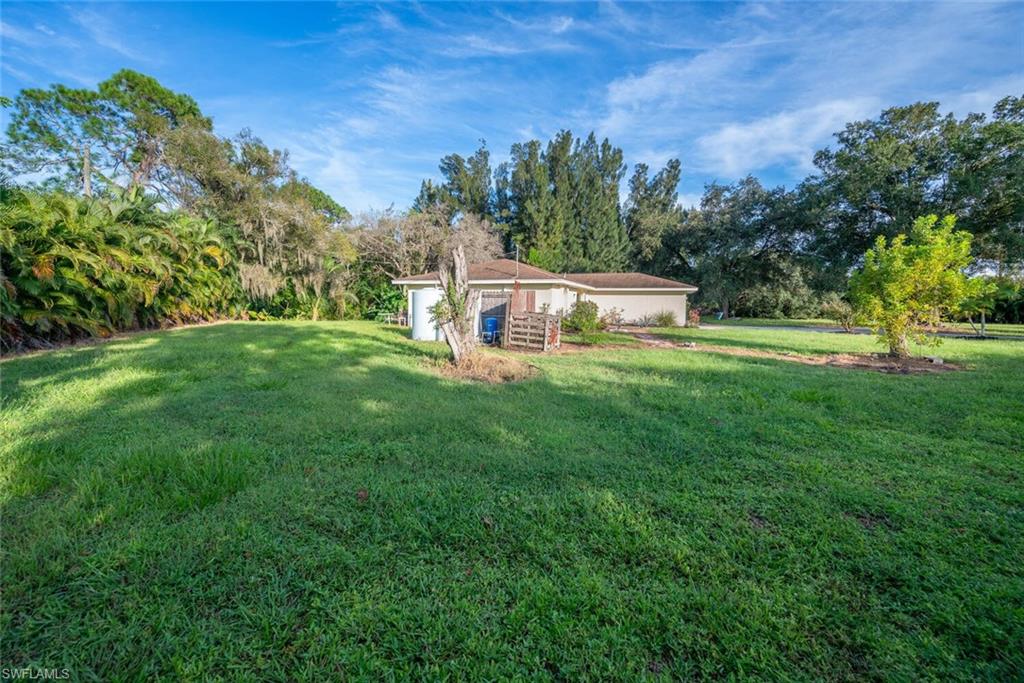 1981 Seminole Harbor Drive Alva, FL 33920 - Photo 4 of 19 a view of a house with a big yard