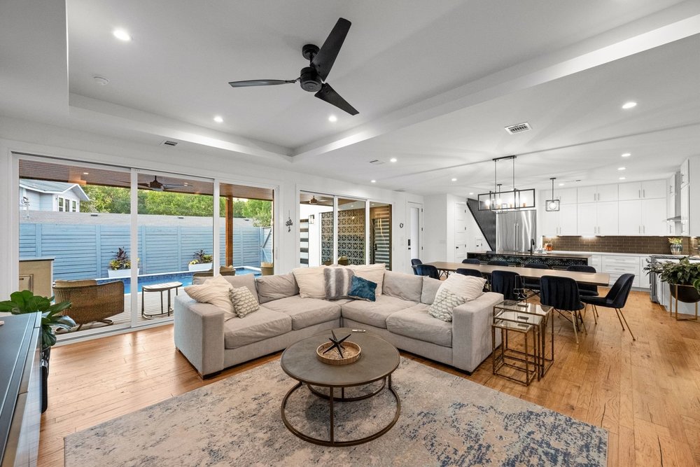 1003 Taffy Court Austin, TX 78704 - Photo 13 of 40 a living room with furniture and a large window