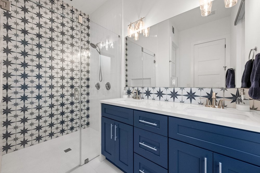 1003 Taffy Court Austin, TX 78704 - Photo 21 of 40 a bathroom with a sink mirror and