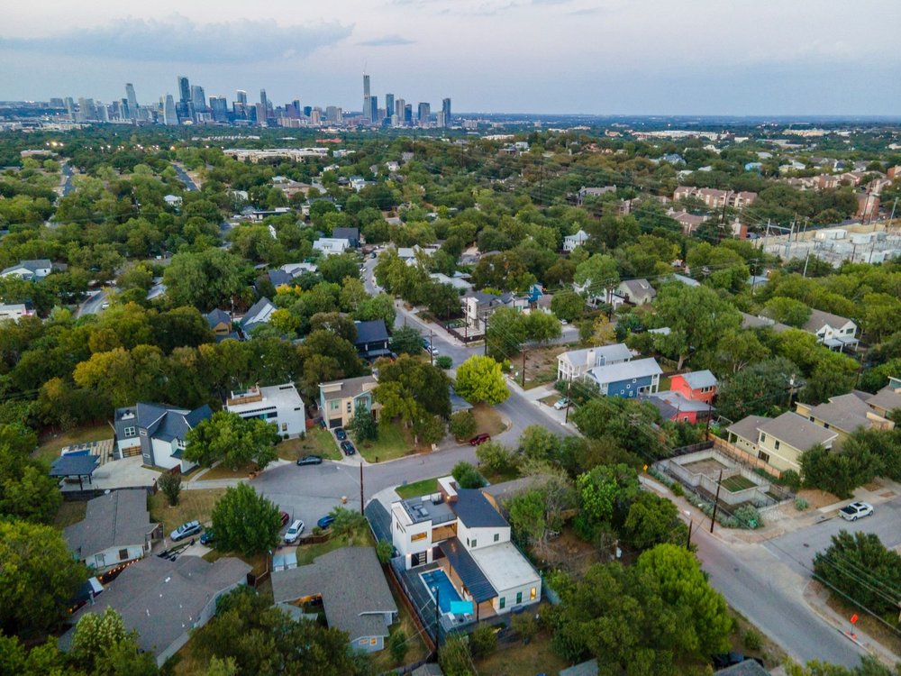 1003 Taffy Court Austin, TX 78704 - Photo 6 of 40 an aerial view of a city with lots of residential buildings