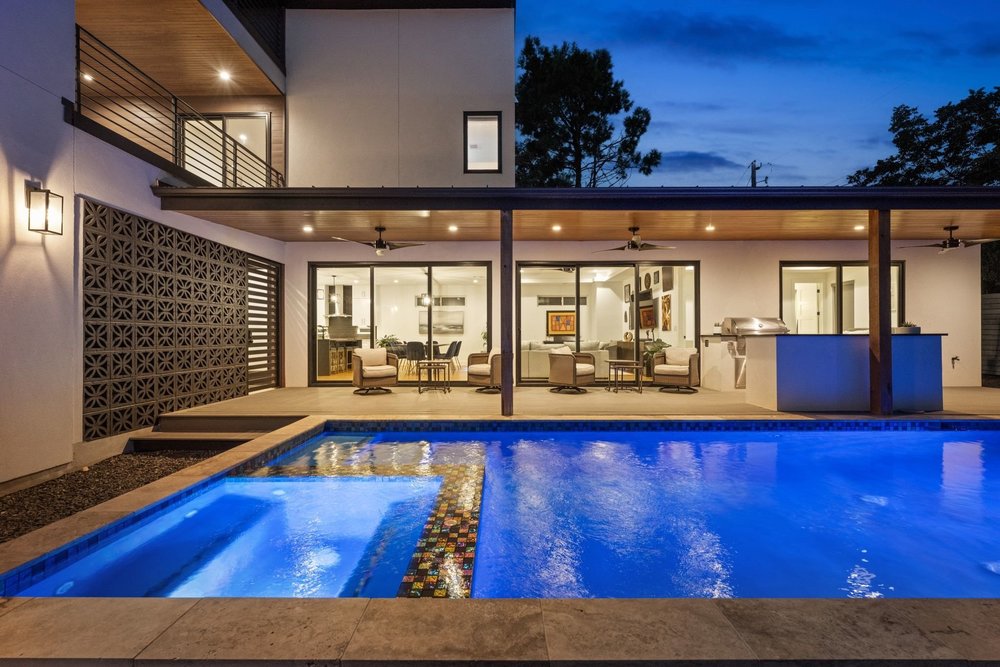 1003 Taffy Court Austin, TX 78704 - Photo 7 of 40 a living room with couch next to a large window