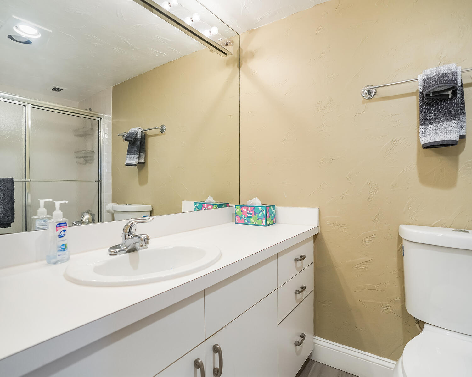 2671 South Course Drive, Unit 907 Pompano Beach, FL 33069 - Photo 18 of 21 a bathroom with a sink a toilet and shower