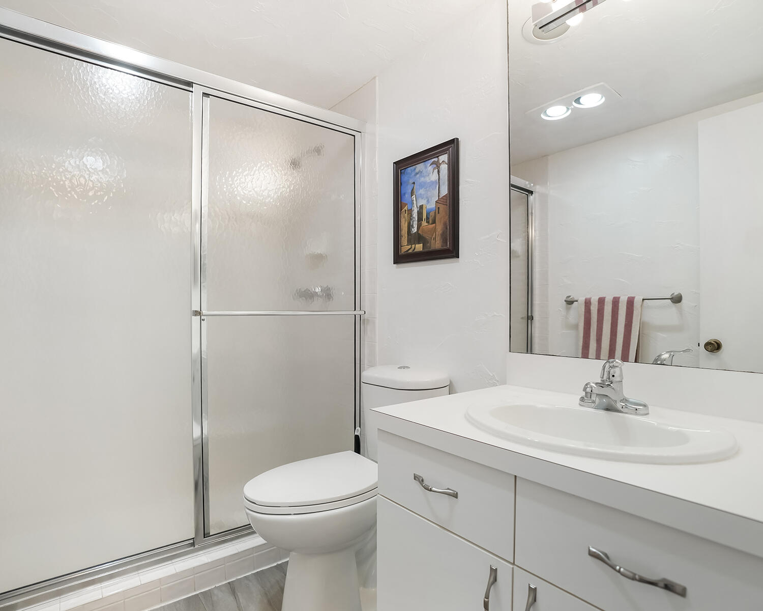 2671 South Course Drive, Unit 907 Pompano Beach, FL 33069 - Photo 6 of 21 a bathroom with a sink mirror vanity and toilet
