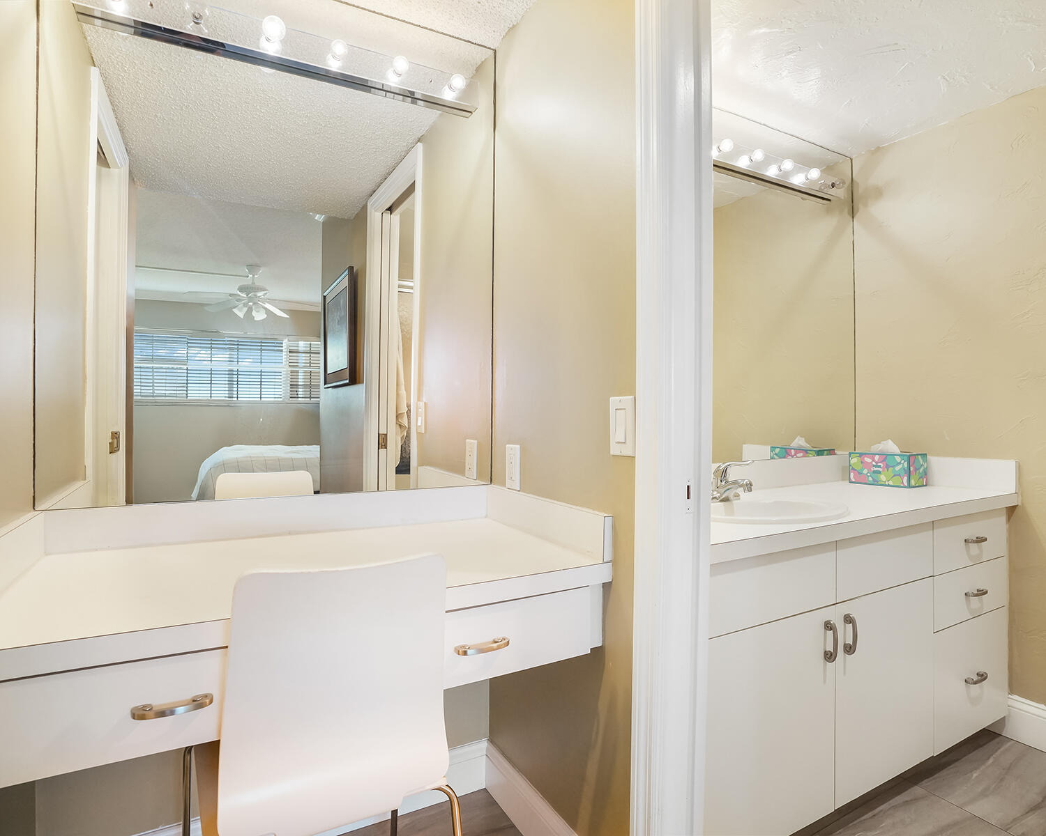 2671 South Course Drive, Unit 907 Pompano Beach, FL 33069 - Photo 8 of 21 a en suite bathroom with a sink a mirror and a shower