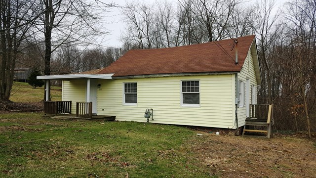 103 Rock Lane Rimersburg, PA 16248 - Photo 1 of 1 a view of a house with a backyard