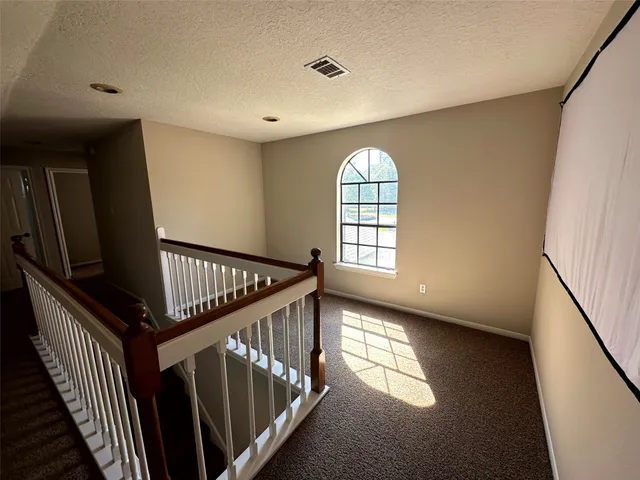 a view of entryway with stairs