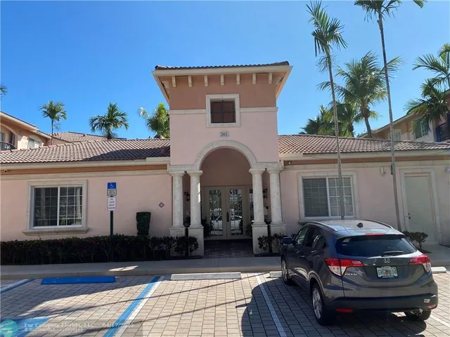 a car parked in front of a house