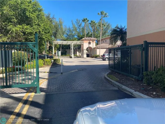 a view of a house with backyard porch and sitting area