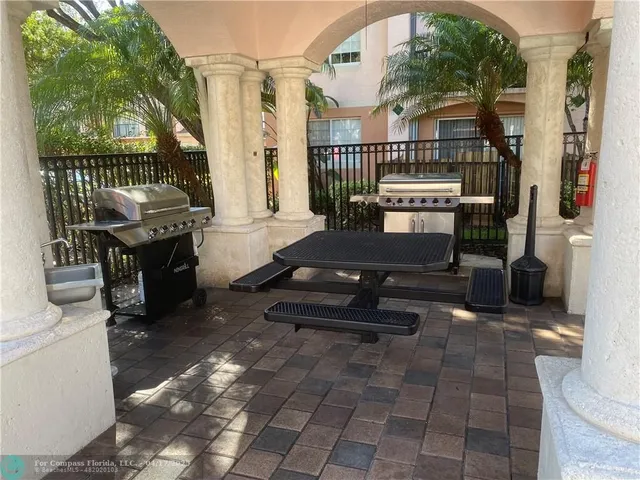 a building outdoor space with patio furniture